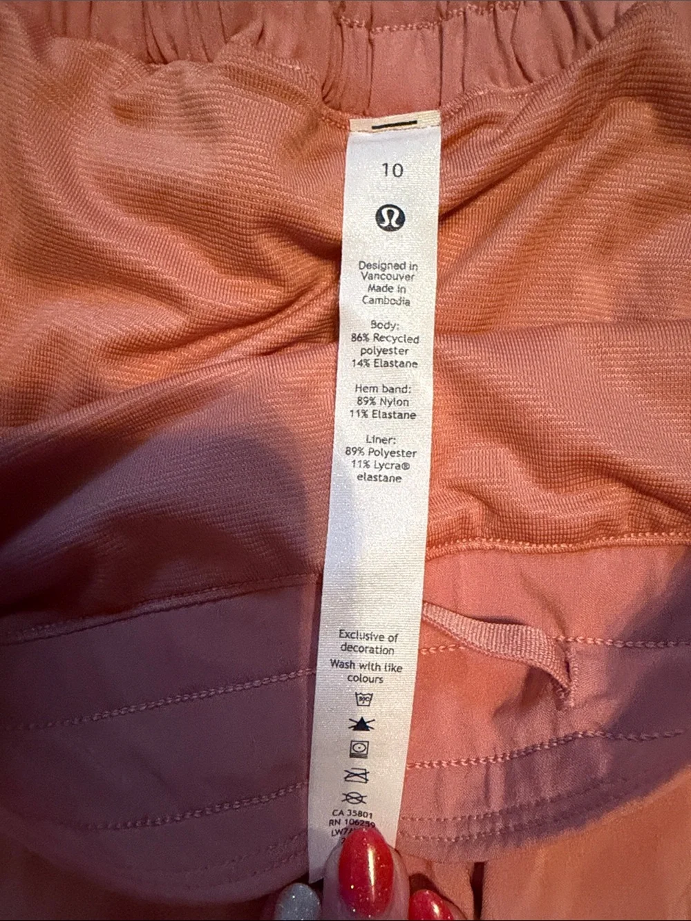 Lululemon Hotty Hot high rise 4”, size 10  Coral